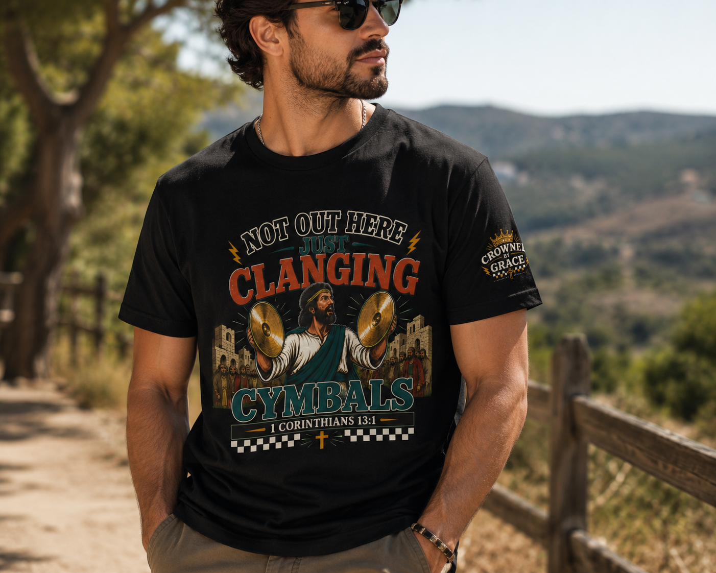 Not Out Here Just Clanging Cymbals Shirt | 1 Corinthians 13:1 Christian Graphic Tee | Faith Streetwear by Crowned By Grace